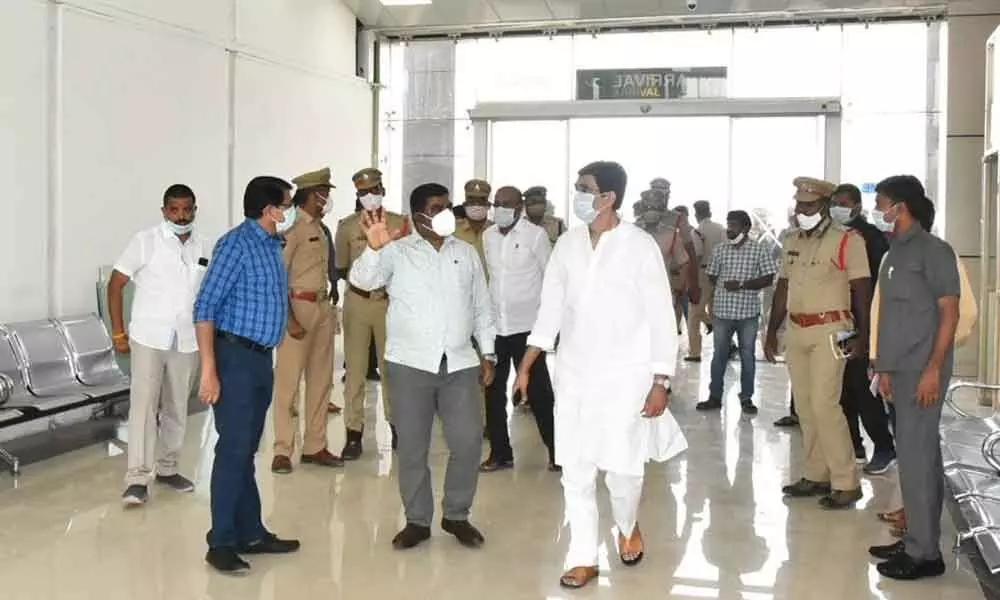Finance Minister Buggana Rajendranath Reddy, Collector G Veera Pandiyan and other officials during an inspection of Orvakal Airport in Kurnool district on Friday