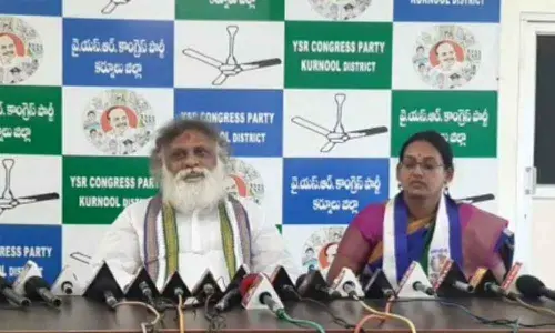 Mayor B Y Ramaiah along with by Deputy Mayor S Renuka addressing a media conference at YSRCP office in Kurnool on Friday