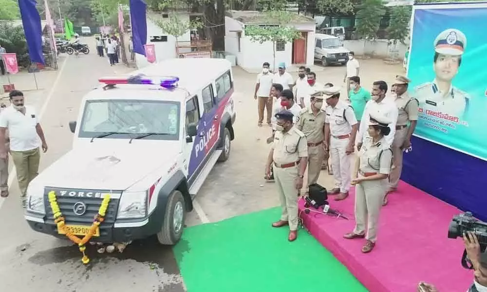 SP B Rajakumari and other police officials with special vehicles sanctioned for women police in Vizianagaram on Saturday