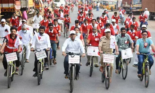 Collector K V N Chakradhar Babu, SP Bhaskar Bhushan launch cycle rally