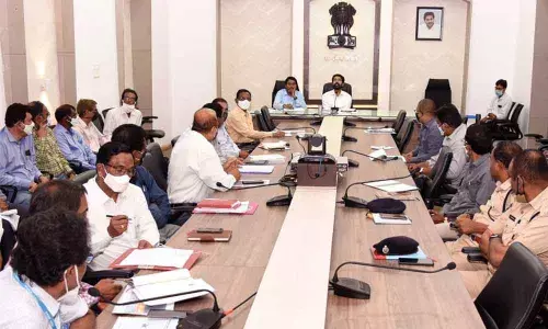 Collector D Muralihdar Reddy holding a review meeting in Kakinada on Tuesday