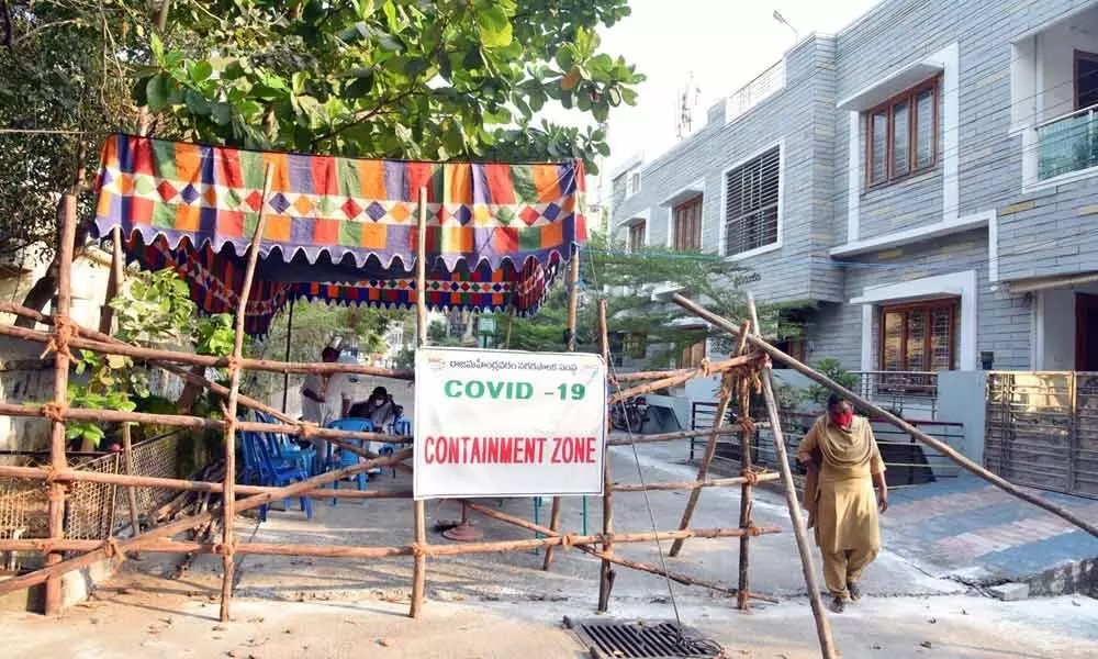 Municipal corporation closed MRO office road, which falls under containment zone in Rajamahendravaram on Wednesday