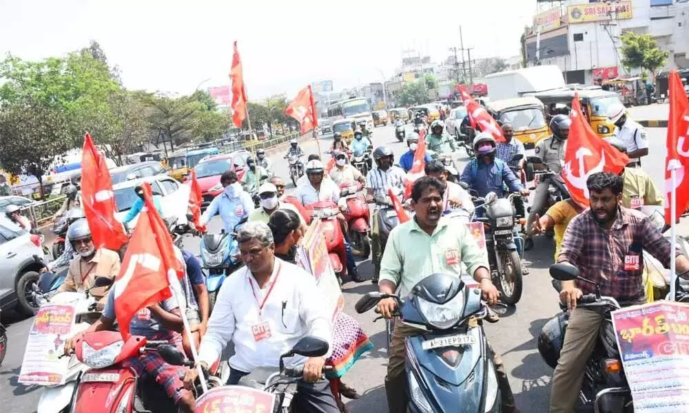 Seeking support to make Bharat bandh a success, CITU representatives taking out a bike rally from Maddilapalem junction to Venkojipalem in Visakhapatnam