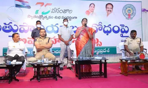 Home Minister Mekathoti Sucharita addressing awareness meeting on control of sedatives in Ongole on Thursday