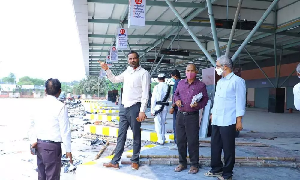 District Collector RV Karnan inspecting the works of new bus stand in Khammam on Friday