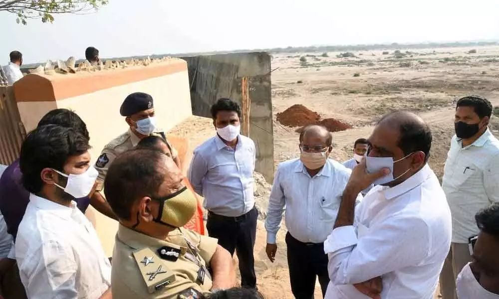 CM Programmes Coordinator Talasila Raghuram along with District Collector A Md Imtiaz visiting the north river bank in Vijayawada on Friday