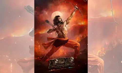 Junior NTR Drops The First Look Poster Of Ram Charan Tej (Alluri SitaRamaraju) From RRR Movie