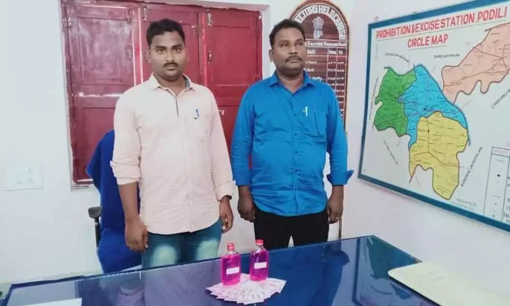 SEB CI Batchala Venkata Rao and constable Shaik Shamsher caught red handed by ACB at SEB office in Podili on Saturday