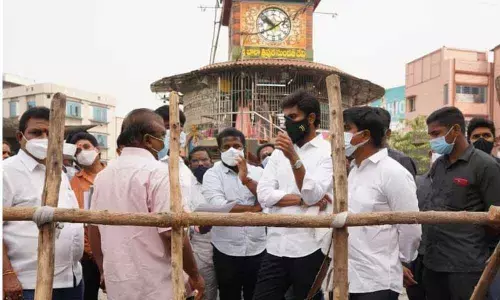 MP Margani Bharat Ram and municipal corporation commissioner Abishikt Kishore inspecting ongoing works at Devi Chowk in Rajamahendravaram on Saturday