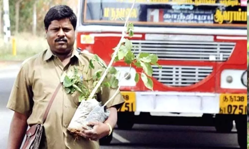 Marimuthu Yoganathan, a bus conductor in Tamil Nadus Coimbatore city