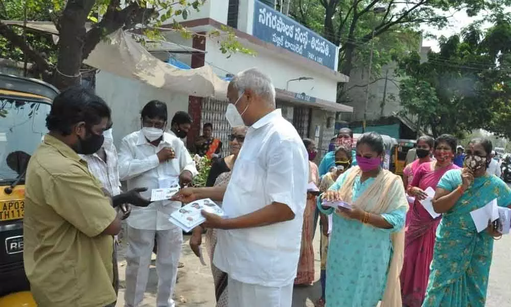 Congress party candidate Dr Chinta Mohan participating in door-to-door campaign in the colonies near SV Medical College area in Tirupati on Sunday