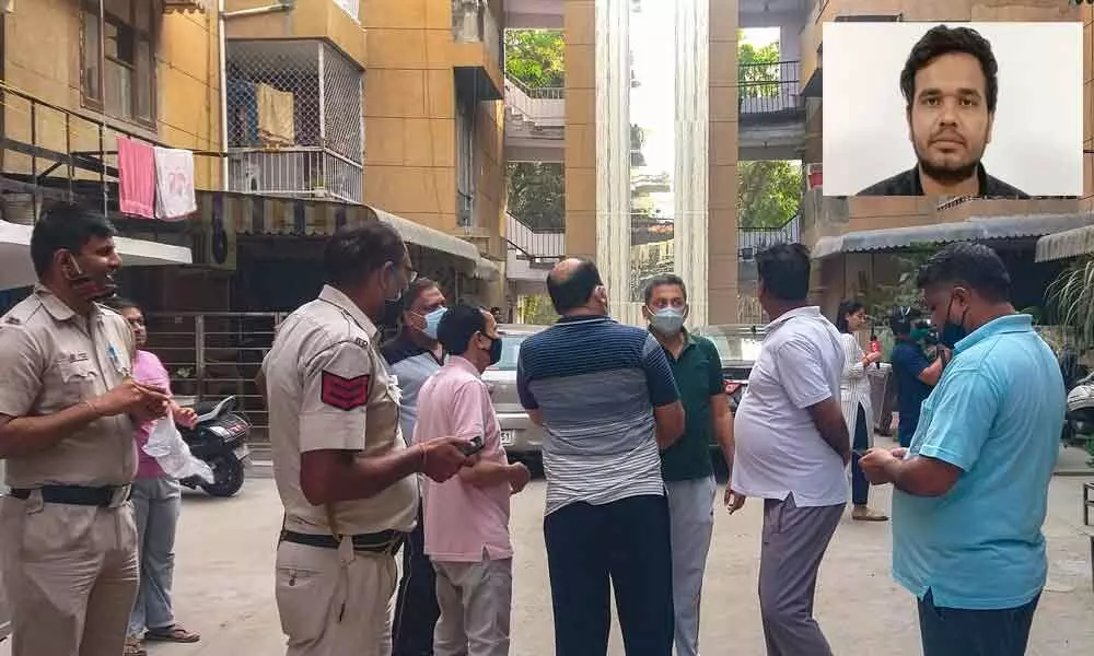 Police personnel at Tulsi Apartment after killing of criminal Kuldeep Fajja in an encounter, at Rohini in New Delhi on Sunday. (Inset) Kuldeep Maan alias Fajja
