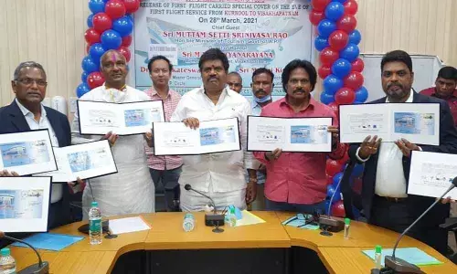 Tourism Minister M Srinivasa Rao, Chief Post Master General M Venkateswarlu, Visakhapatnam MP M V V Satyanarayana and other dignitaries launching postal carrier cover in Visakhapatnam Airport on Sunday