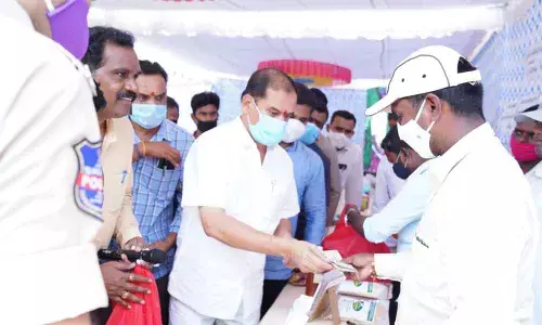 Chief Whip D Vinay Bhaskar buying farm products at the Organic Mela organised by Annadata Organic Farmer’s Cooperative Society