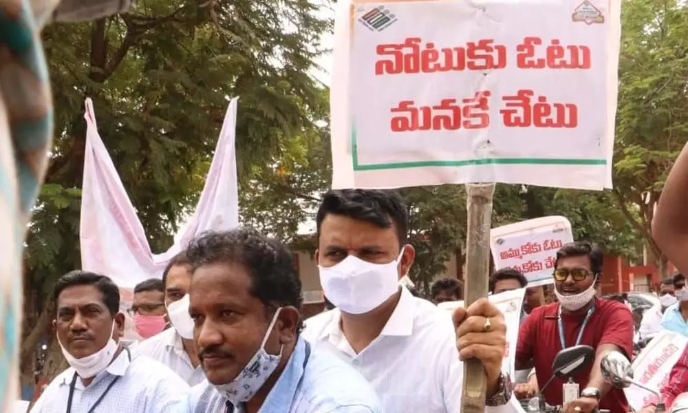 MCT Commissioner P S Girisha participating in voters awareness rally in Tirupati on Monday