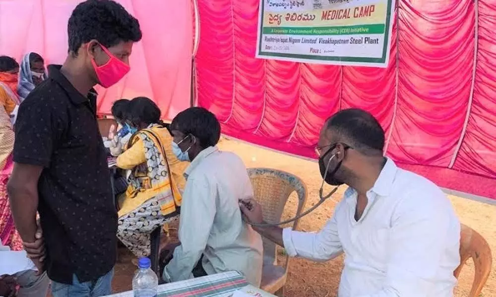 Locals at a free integrated medical camp organised by Sri Sathya Sai Seva Organisation in Visakhapatnam