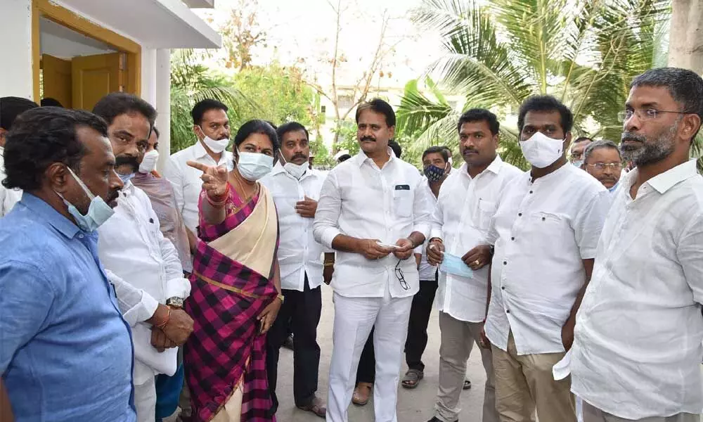 MP Mopidevi Venkata Ramana Rao, Mayor Kavati Manohar Naidu and MLA Maddali Giridhhara Rao reviewing arrangements for launch of vaccination programme at ward secretariatsby Chief Minister YS Jagan Mohan Reddy