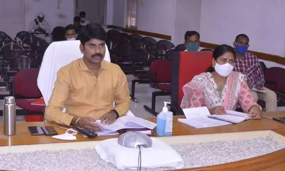 District Collector C Narayana Reddy and DPO Jayasudha participating in a video conference, which SEC Parthasarathi held from Hyderabad