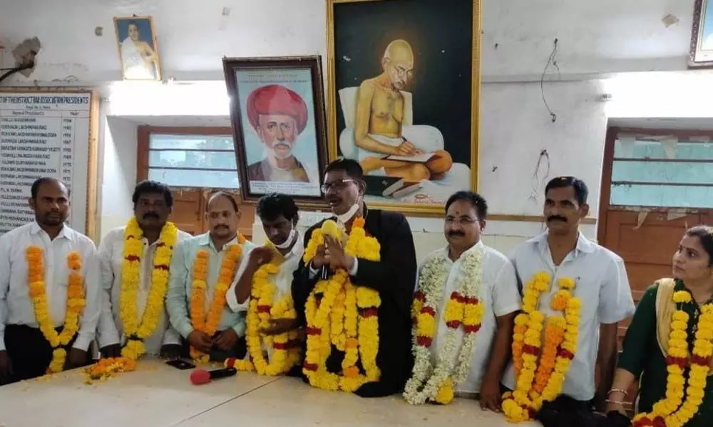 Members of new executive body of Bar Association being felicitated in Srikakulam on Tuesday