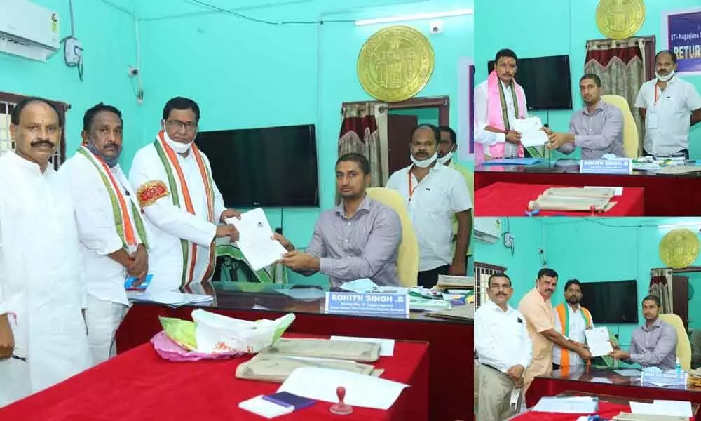 Congress candidate Jana Reddy, TRS’ Nomula Bhagat and BJP’s Ravi Nayak submit their nomination papers to the MRO, Nidamanur for the Nagarjuna Sagar bypoll on Tuesday.  Photos: Mucharla Srinivas