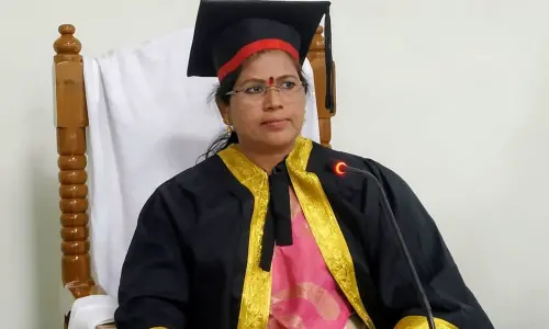 Mayor Gangada Sujatha announcing agenda approved in Ongole Municipal Council meeting on Wednesday