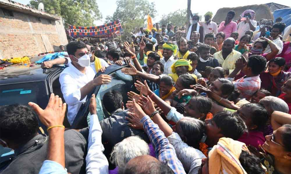 TDP supporters welcoming party general secretary Nara Lokesh at Lakkarajugarlapadu village under Sattenapalli Assembly constituency during his visit on Wednesday