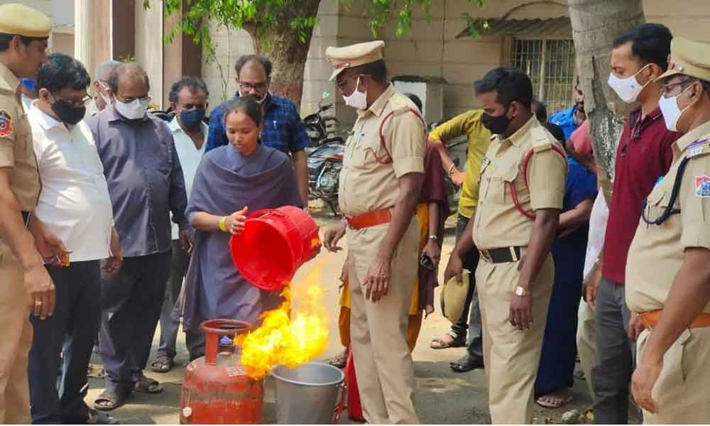 Mock fire drill being performed at Tuni railway station on Wednesday