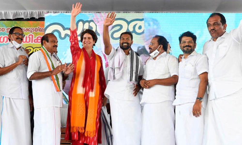 Congress leader Priyanka Gandhi Vadra waves at the crowd during a public meeting for Kerala Assembly polls, at Irinjalakuda, Thrissur on Wednesday