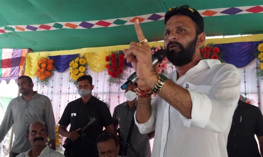 Civil Supplies Minister Kodali Nani addressing a public meeting in Gudivada after inauguration of the Gudivada-Kankipadu road development works on Thursday