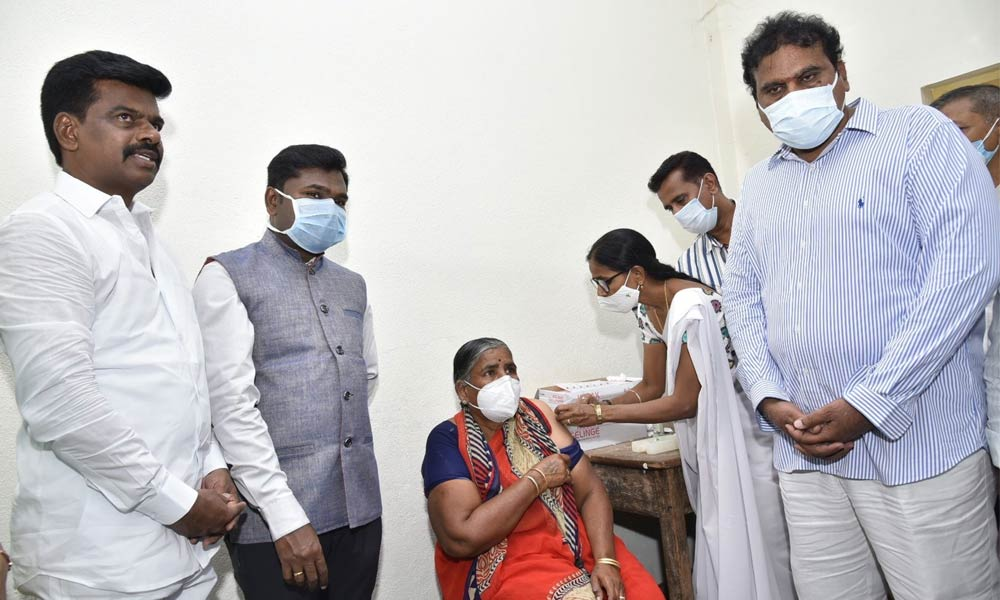District Collector Gandham Chandrudu and Hindupur MP Gorantla Madhav participating in the Covid vaccination programme at the Sri Krishnadevaraya municipal high school in 48th ward in Anantapur on Thursday
