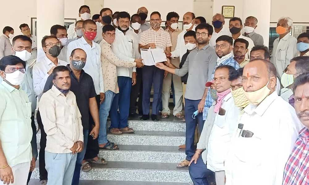 TRSMA representatives submitting a representation to District Collector  K Shashanka at Karimnagar Collectorate on Thursday