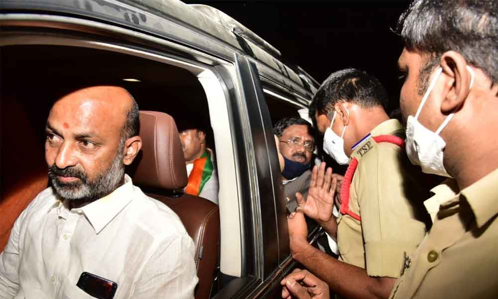 BJP chief Bandi Sanjay Kumar being arrested by police on his way to attend the last rites of Kakatiya University student Sunil on Friday