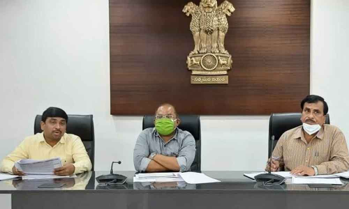 Collector A Md Imtiaz reviewing the progress of the construction of Jagananna colonies with the officials in Vijayawada