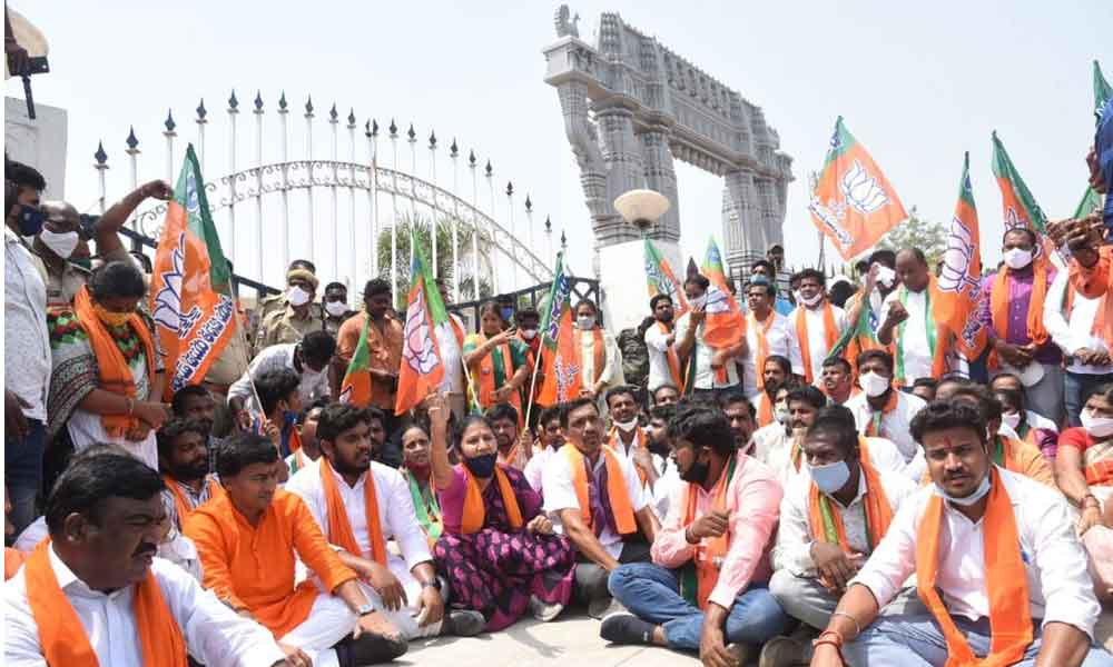 BJP activists stage a sit-in protest at Warangal Collectorate on Saturday
