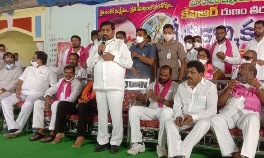 Minister for Energy G Jagadish Reddy addressing toddy workers at a meeting in Halia on Sunday. Prohibition and Excise Minister V Srinivas Goud also seen