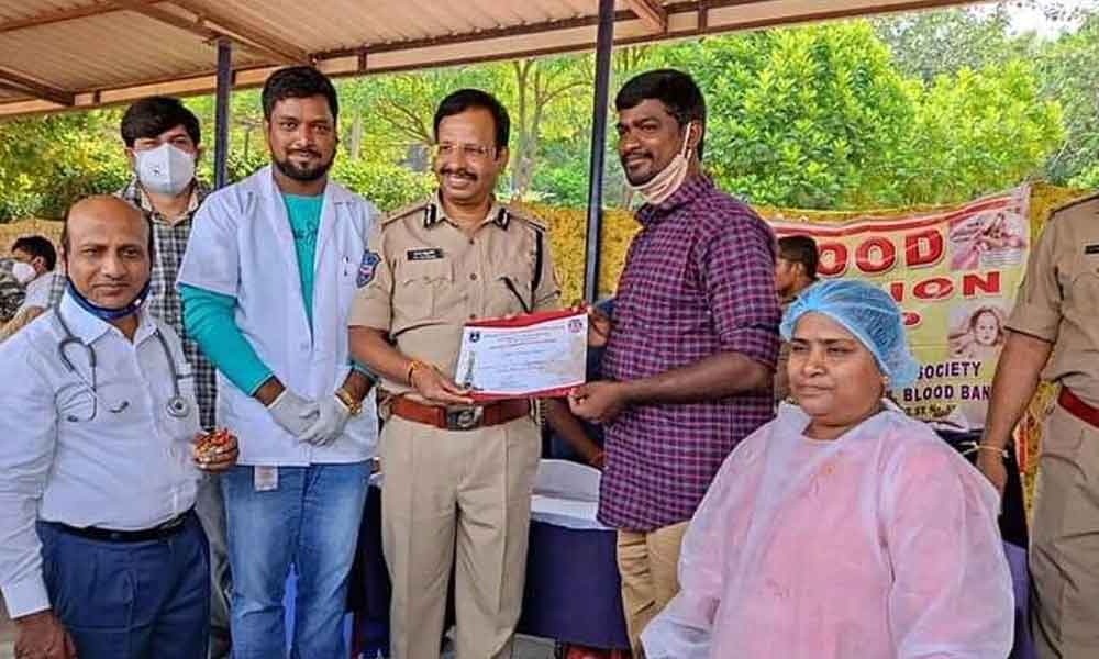 Green Again founder Mahesh Talari seen on right to Cyberabad Police Commissioner V C Sajjanar at a programme jointly taken up with the police.