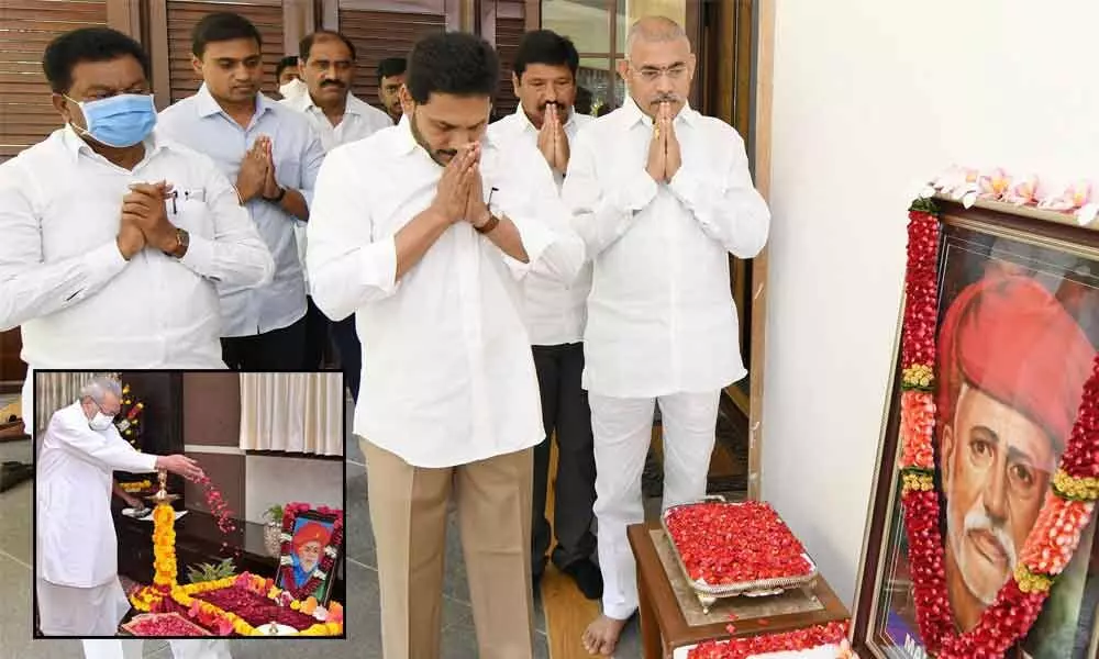 Governor Biswa Bhusan Harichandan paying floral tributes to Mahatma Jyotirao Phule at a function organised on the occasion of his birth anniversary at Raj Bhavan in Vijayawada on Sunday; Chief Minister Y S Jagan Mohan Reddy paying tributes to Mahatma Phule at his camp office in Tadepalli on Sunday