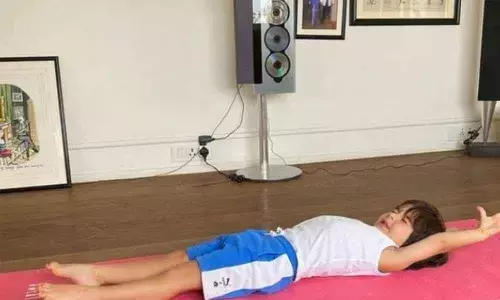 Kareena shares picture of Taimur doing yoga