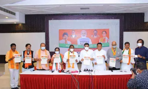 BJP State president Somu Veerraju, Jana Sena PAC chairman Nadendla Manohar and other leaders releasing election manifesto in Tirupati on Sunday