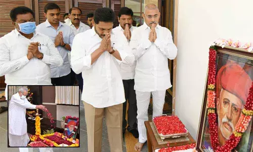 Governor Biswa Bhusan Harichandan paying floral tributes to Mahatma Jyotirao Phule at a function organised on the occasion of his birth anniversary at Raj Bhavan in Vijayawada on Sunday; Chief Minister Y S Jagan Mohan Reddy paying tributes to Mahatma Phule at his camp office in Tadepalli on Sunday