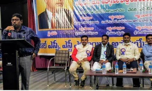 AP Transco DEE Vinay Kumar addressing at the State-level meeting in Ongole on Sunday