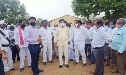 R&B Minister V Prashanth Reddy inspecting helipad site at Achampet village on Monday. Jukkal MLA Hanmanth Shinde and Additional Collector Venkatesh Dotre also seen
