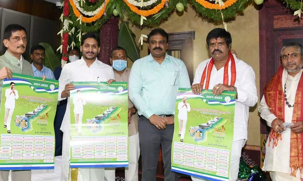 Chief Minister Y S Jagan Mohan Reddy releases the calendar of State government’s welfare schemes for 2021-22 at his camp office on Tuesday