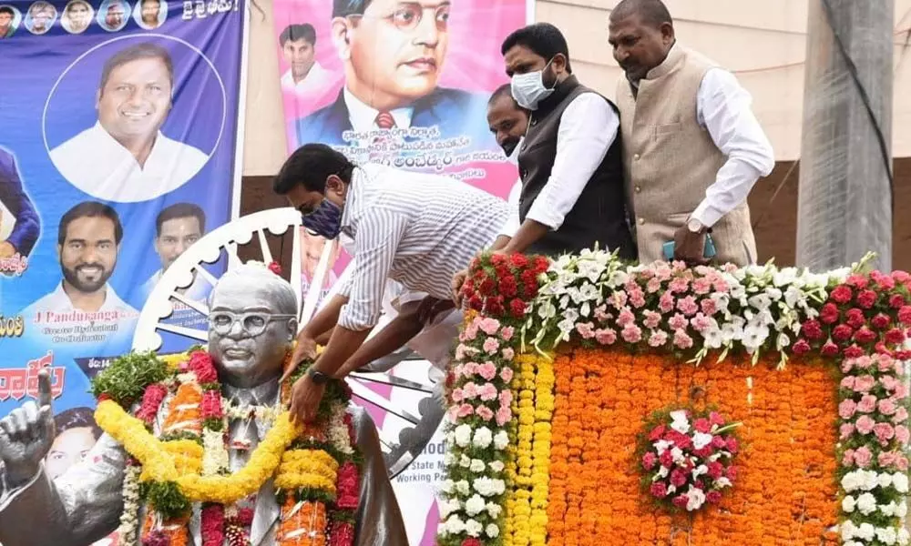 Ministers KT Rama Rao and Eatala Rajendar offered garland to the Ambedkar statue on the tank bund in Hyderabad.