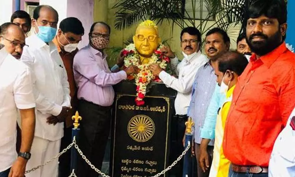 SDLCE, Kakatiya University, Director Prof Guguloth Veeranna garlanding the statue of BR Ambedkar on his 130th birth anniversary