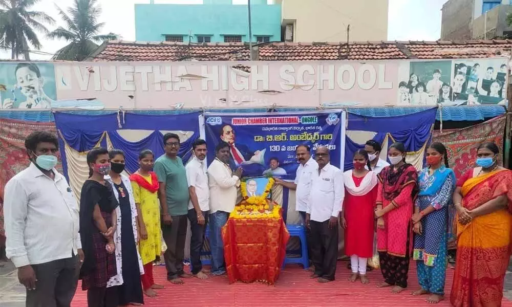 JCI Ongole members paying rich tributes to Dr BR Ambedkar in Ongole on Wednesday