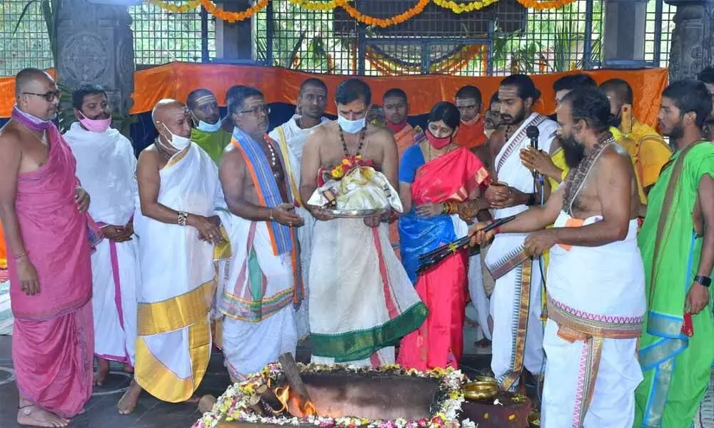 Temple Executive Officer K S Rama Rao’s couple offering Purnahuti at the Homagundam to mark the completion of five days Ugadi Utsavama in Srisailam temple