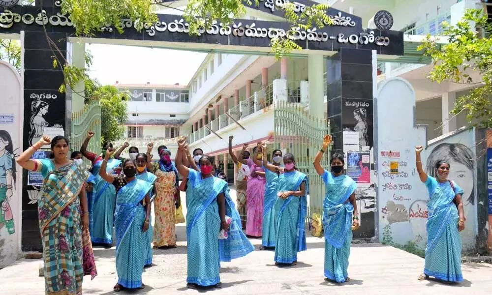 Mini Anganwadi workers staging protest at the office of ICDS PD in Ongole on Thursday