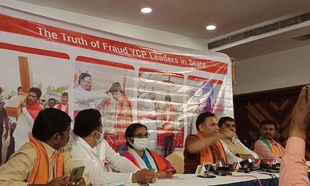 BJP national secretary Sunil Deodhar speaking to media in Tirupati on Thursday. Party nominee K Ratna Prabha is also seen