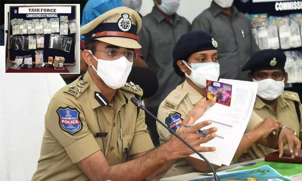 Commissioner of Police Tarun Joshi speaking to media persons in Warangal on Friday; Currency, smartphones and scratch cards seized by the police from the gang of cheaters (Inset Pic)